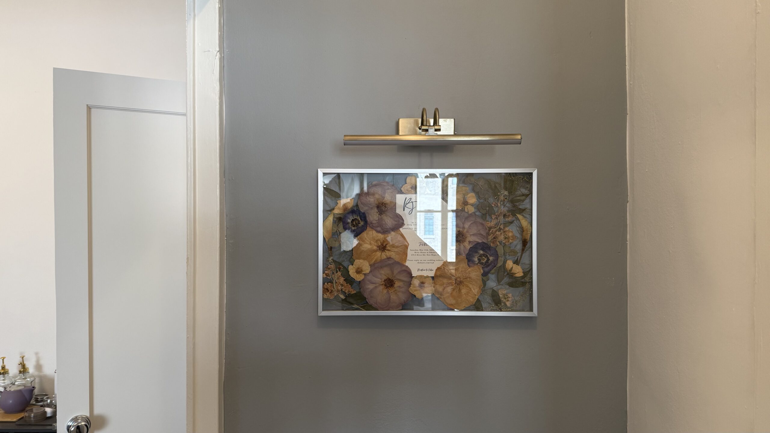 Here is an example of perfectly mounted frames complete with a spotlight