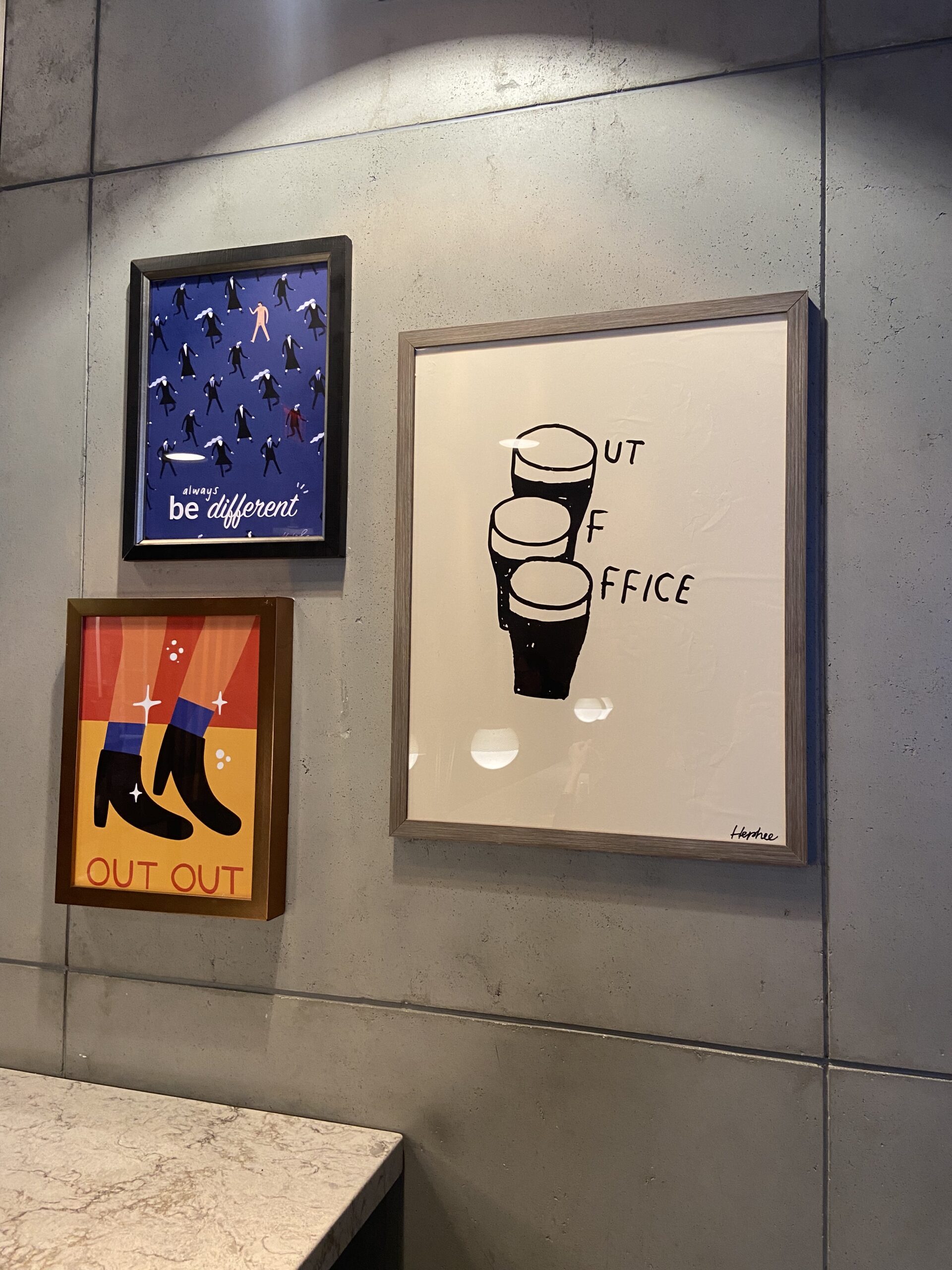 Three frames mounted on top of a tile, thanks to our handyman