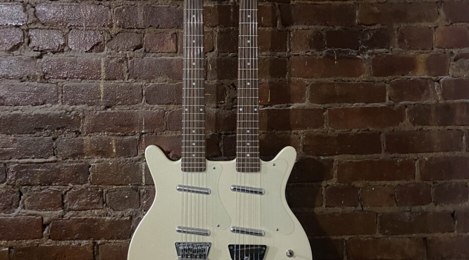 Double-Neck Guitar on Brick